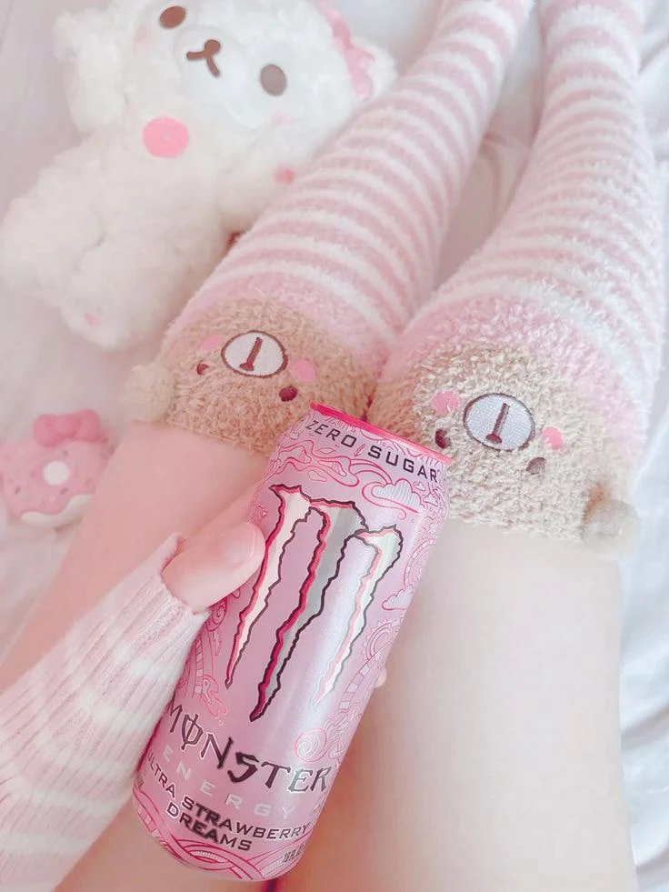 Striped socks and a pink energy drink